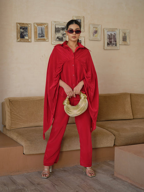 This elegant Shirt is crafted from premium natural crepe fabric, offering a soft texture and graceful drape. The designer shirt features a flowy silhouette that adds movement and sophistication to the overall look. With its comfortable fit and refined finish, this Shirt is a perfect blend of modern style and effortless elegance ideal for both casual outings and special occasions.