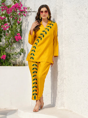 This elegant kurta features delicately hand-painted leaf motifs that celebrate the beauty of nature. Inspired by the vibrant hues of a botanical garden, it blends artistic expression with refined craftsmanship, creating a timeless and distinctive look.