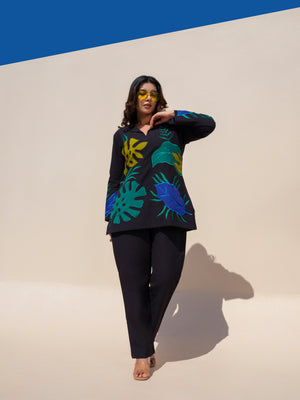 Crafted for effortless elegance, this stylish black kurta features a flattering V-neckline and bold hand-appliquรฉd botanical motifs in vibrant shades of green, blue, and yellow. With its relaxed silhouette and full sleeves, it offers the perfect blend of comfort, artistry, and contemporary style.
