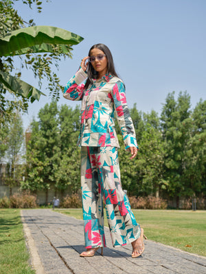 Crafted in breathable mul cotton, this stylish printed shirt features a tailored silhouette with subtle handwork detailing for a refined touch. The vibrant print and comfortable fit make it perfect for effortless everyday elegance.