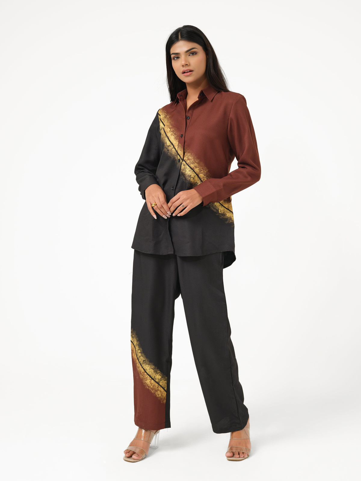 Crafted in soft cotton viscose fabric, this shirt offers a breathable feel with a fluid drape and refined silhouette. Hand-painted detailing with intricate embroidery adds an artistic touch, blending contemporary style with everyday elegance.