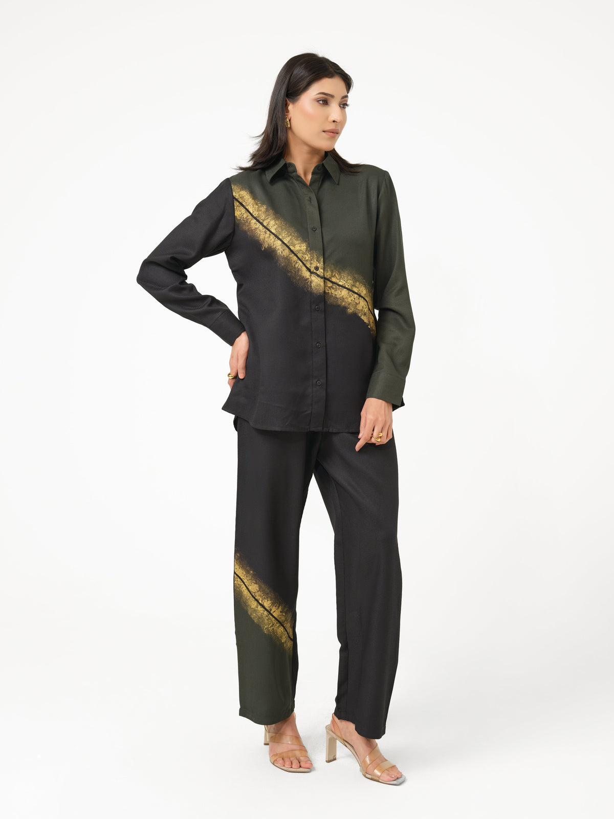 Crafted in soft cotton viscose fabric, this shirt offers a breathable feel with a fluid drape and refined silhouette. Hand-painted detailing with intricate embroidery adds an artistic touch, blending contemporary style with everyday elegance.