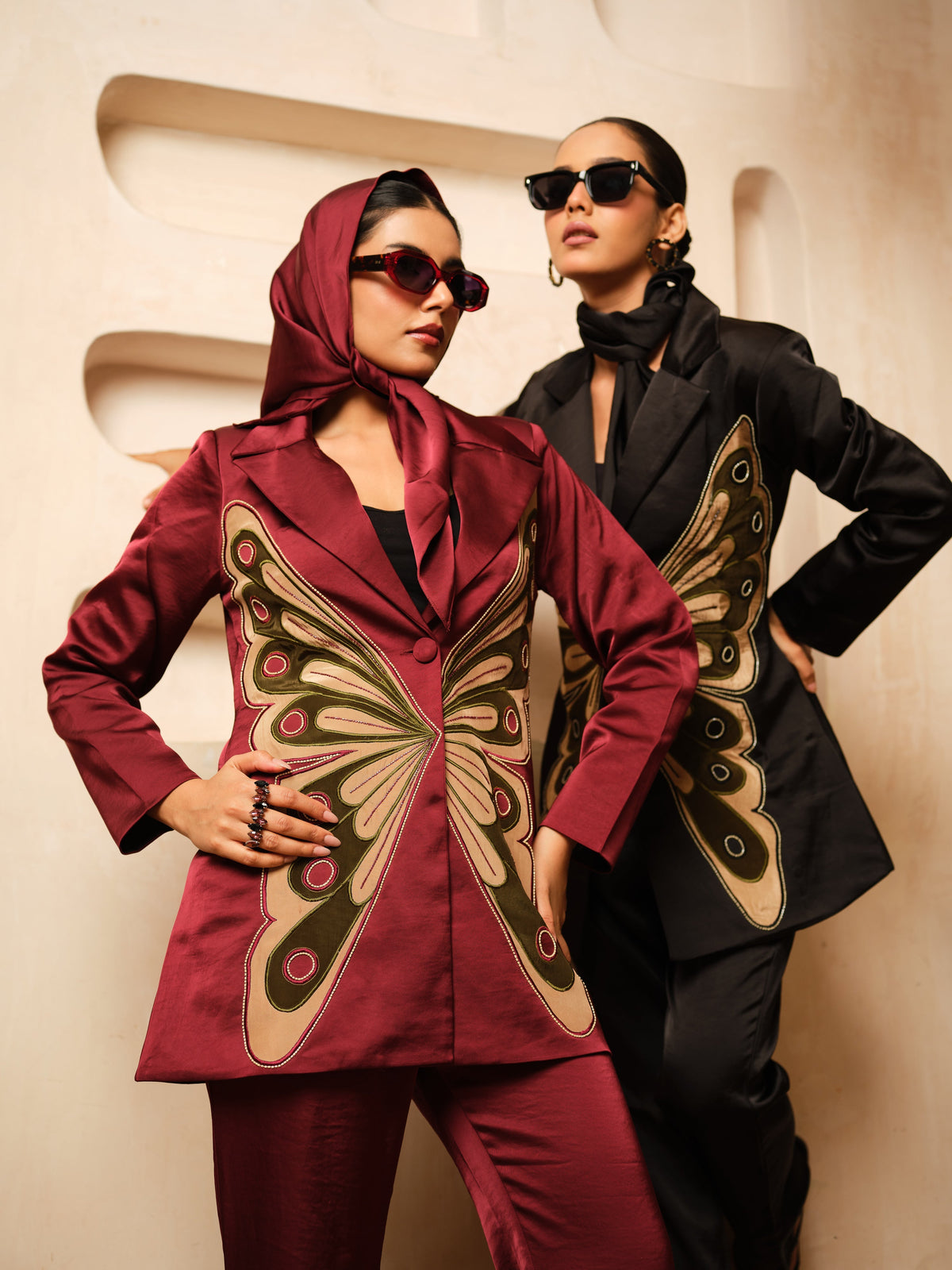 Crafted from luxurious *Imported Satin, this statement *Blazer Co-ord Set&nbsp; features a striking *butterfly appliqué design* enhanced with intricate hand embroidery. The tailored silhouette and artisanal detailing create a perfect balance of elegance and contemporary style, making it an ideal choice for festive occasions, evening events, and special celebrations
