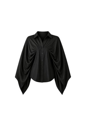 This elegant Shirt is crafted from premium natural crepe fabric, offering a soft texture and graceful drape. The designer shirt features a flowy silhouette that adds movement and sophistication to the overall look. With its comfortable fit and refined finish, this Shirt is a perfect blend of modern style and effortless elegance ideal for both casual outings and special occasions.