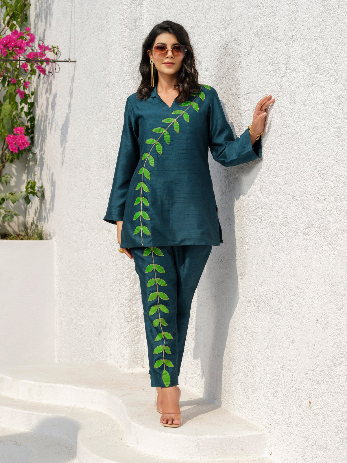 This elegant kurta features delicately hand-painted leaf motifs that celebrate the beauty of nature. Inspired by the vibrant hues of a botanical garden, it blends artistic expression with refined craftsmanship, creating a timeless and distinctive look.