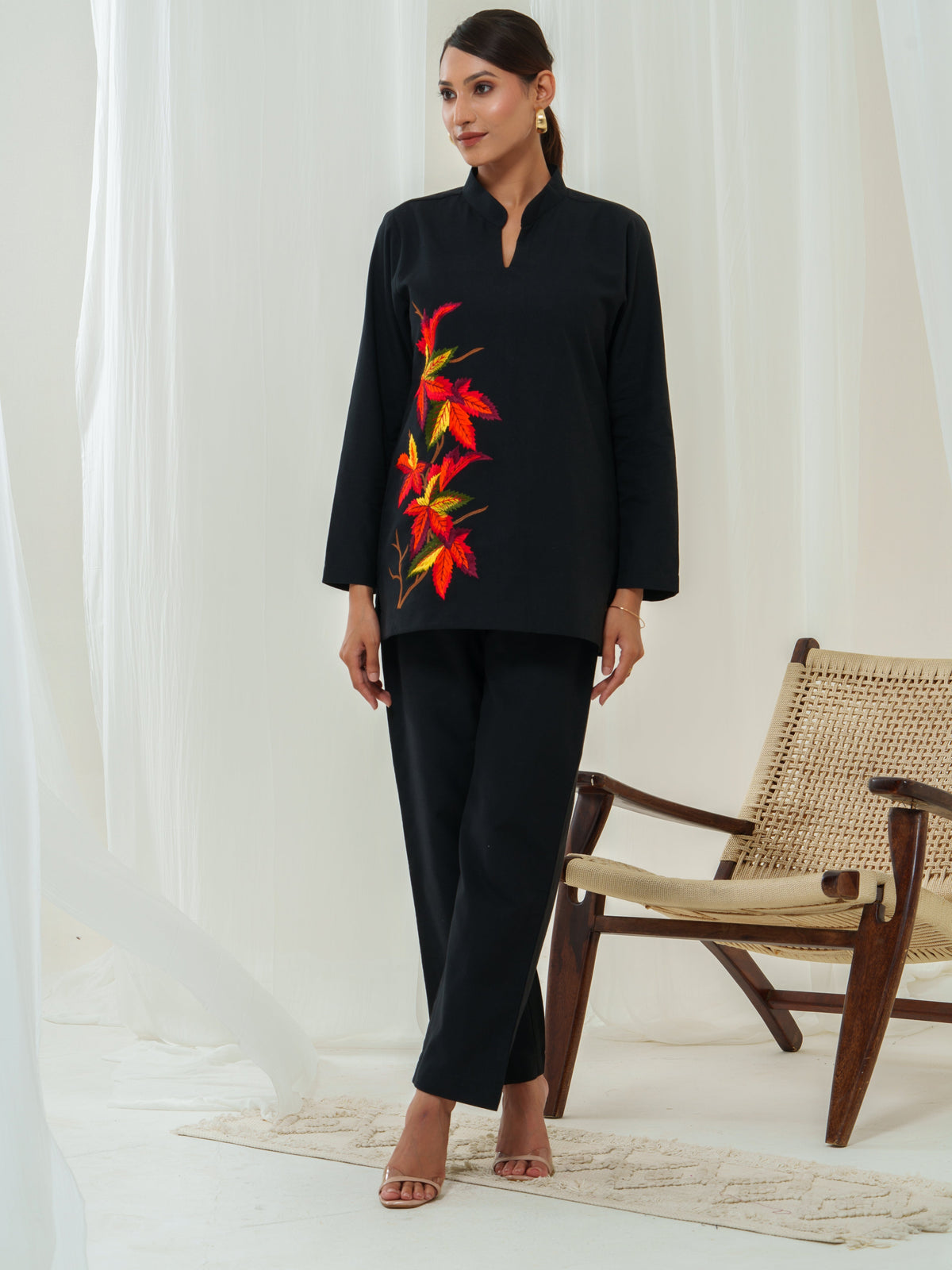 Elevate your wardrobe with this chic Maple Leaves kurta, featuring a sleek V-neckline adorned with vibrant floral embroidery. The intricate detailing adds a touch of sophistication to its minimalist design, making it perfect for office wear, festive occasions, and elegant everyday styling.